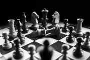grayscale photography of chessboard game
